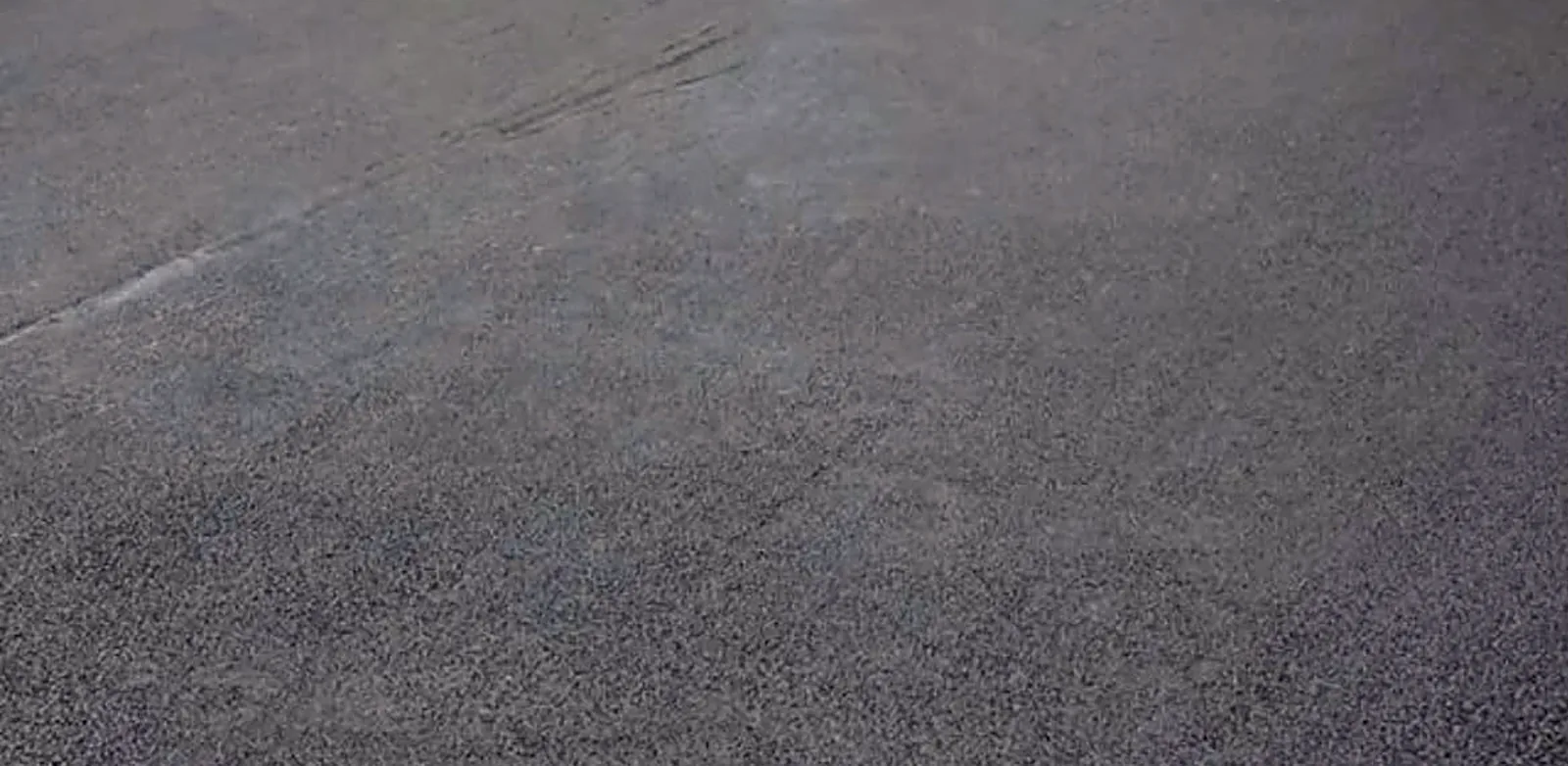 Tarmacadam driveway being rolled in Carrick-on-Suir, Co. Tipperary