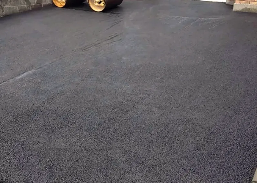 Tarmacadam driveway being rolled in Carrick-on-Suir, Co. Tipperary