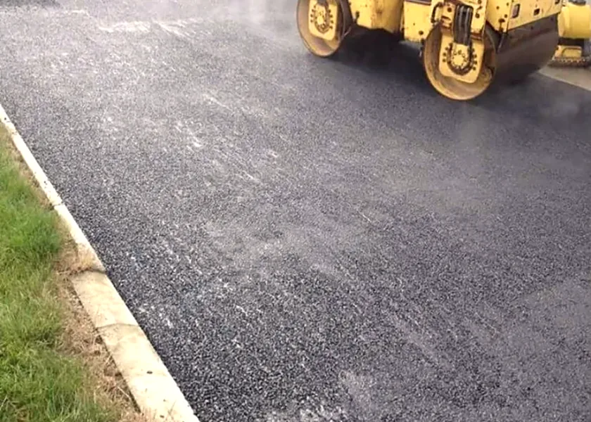 Tarmacadam being rolled in Kilmacow, Co. Kilkenny