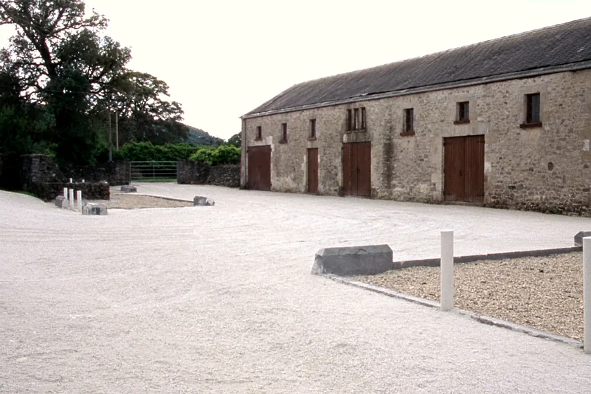 A farm yard cleared and levelled with a stone base