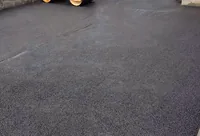 Tarmacadam driveway being rolled in Carrick-on-Suir, Co. Tipperary