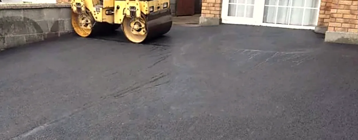 Tarmacadam driveway being rolled in Carrick-on-Suir, Co. Tipperary