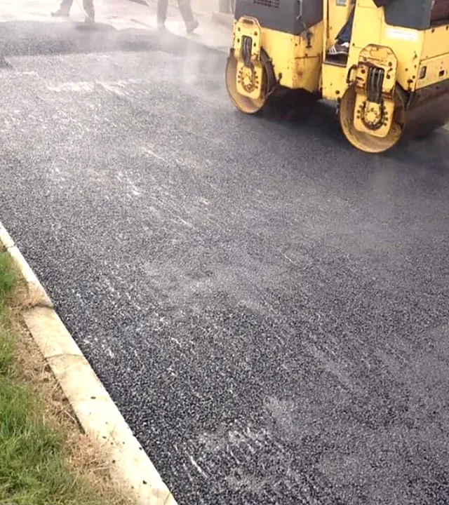 Tarmacadam being rolled in Kilmacow, Co. Kilkenny
