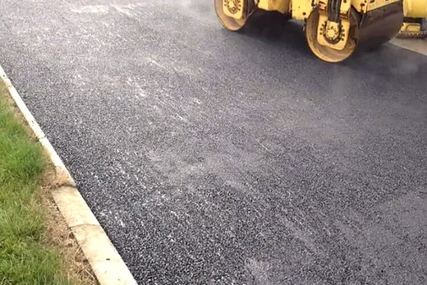 Tarmacadam being rolled in Kilmacow, Co. Kilkenny